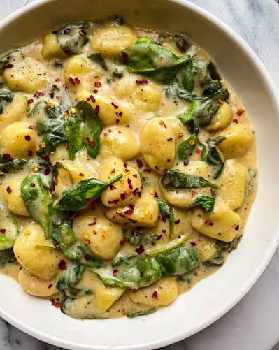 Baked Almond Gnocchi with Swiss Chard and Goat Cheese Alfredo