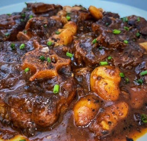 Caribbean OXTAILS W/ 2 SIDES